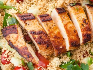 Pomegranate chicken with almond couscous