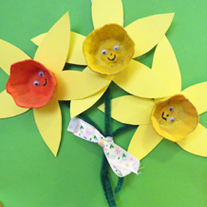 craft daffodils on a green background