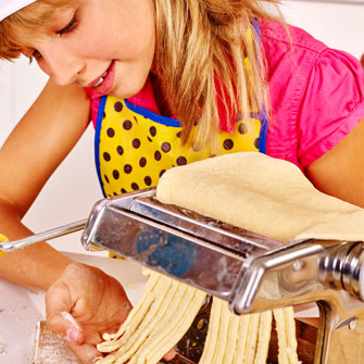 parent and child cooking class -child makes pasta