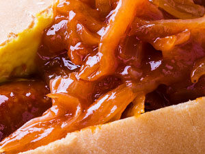 hot dogs with buttery cider onions